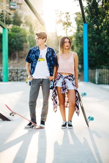 Cool skaters with skateboards