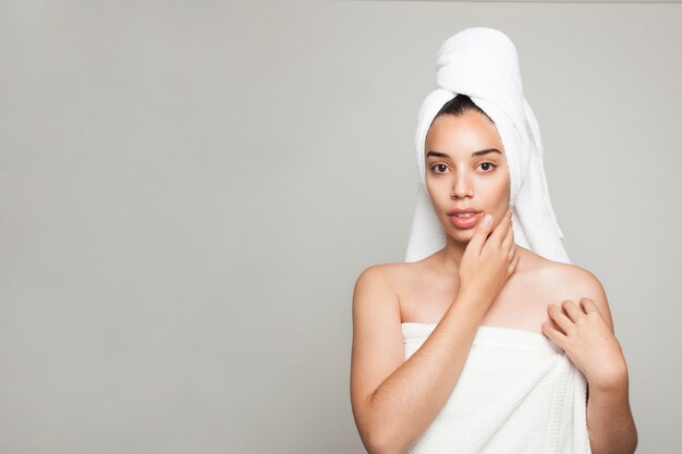 Cool woman posing afterfacial treatment