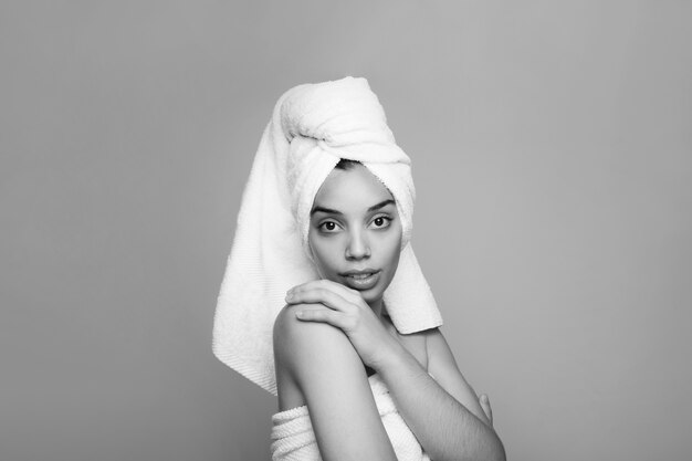 Cool woman with artistic pose after shower