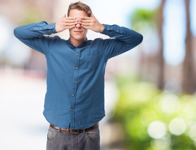 cool young-man covering-eyes