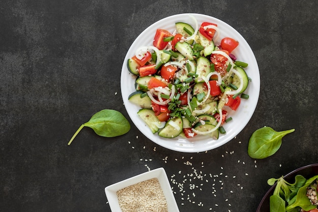 Copy-space bowl with salad on table