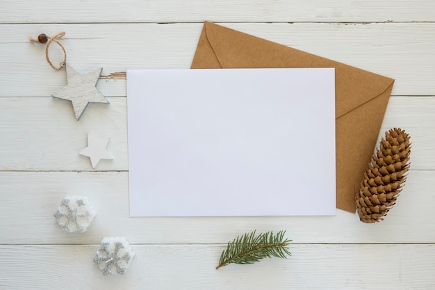 Copy space card with envelope and christmas decoration