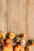 Free photo copy space composition with autumn elements on wooden background