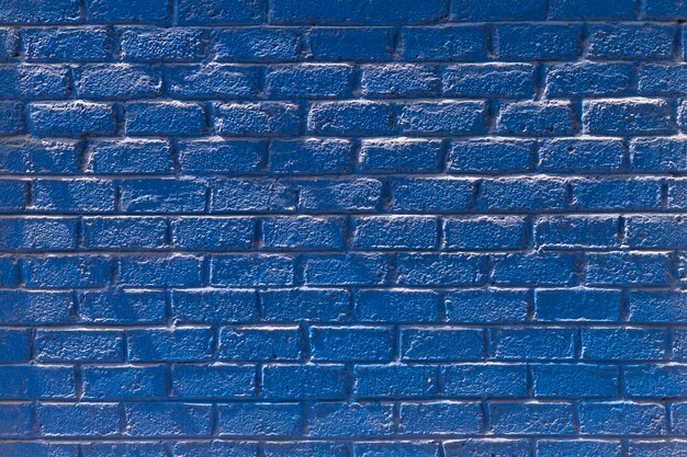 Copy space front view blue brick wall
