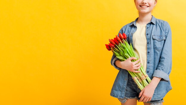 Copy-space girl with flowers