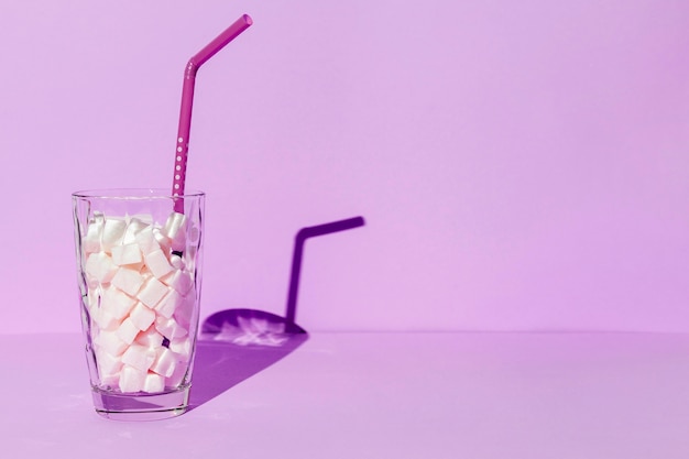 Copy-space glass with sugar cubes