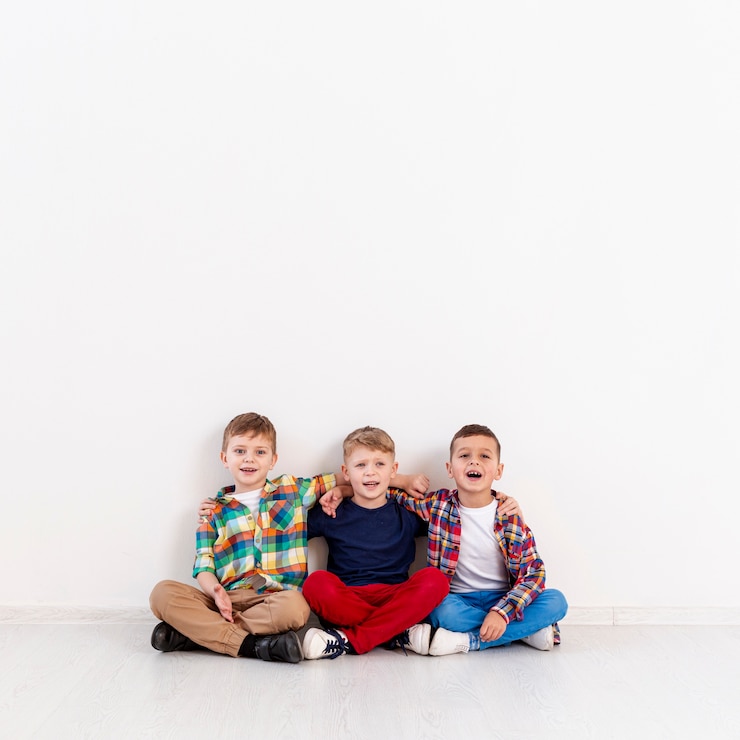 Free Photo copy-space group of boys on floor