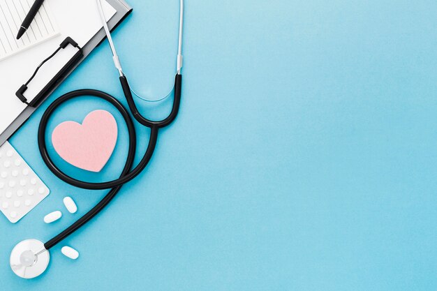 Copy-space heart shape and stethoscope