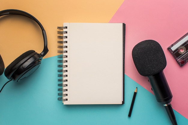 Free photo copy space notepad with mic and headphones