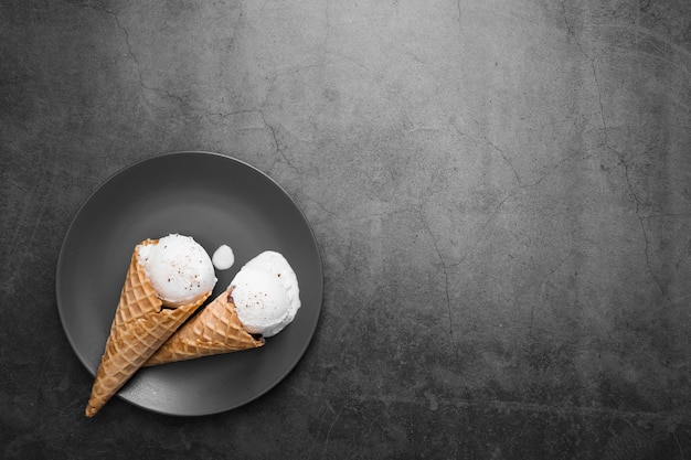 Copy-space plate with ice cream cones