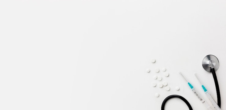 Free Photo copy-space stethoscope and medicine