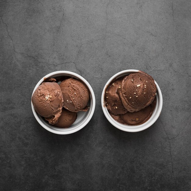 Copy-space two small bowls with ice cream