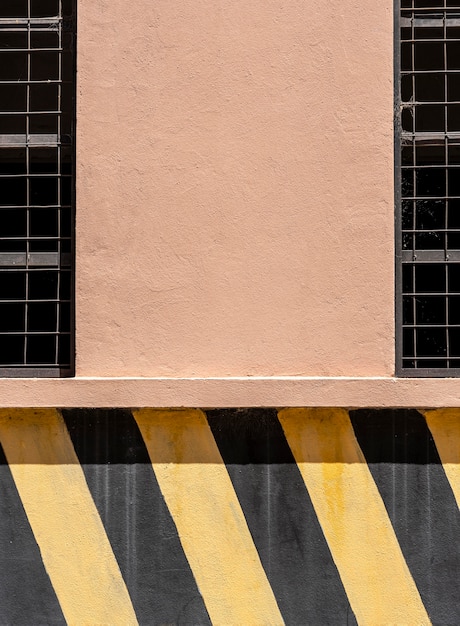 Copy space wall with black and yellow stripes