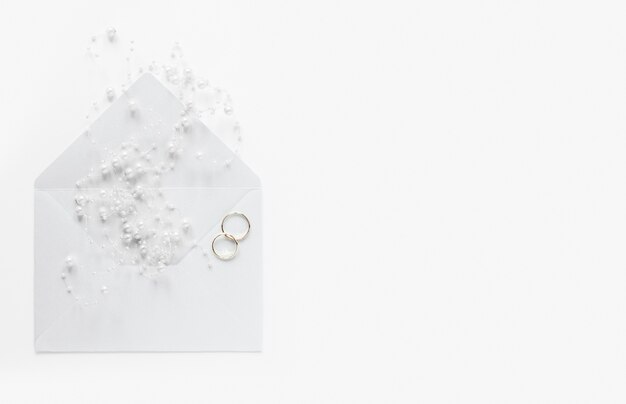 Copy-space wedding card with engagement rings