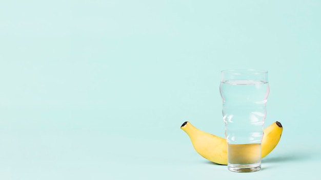Copy space with banana and water