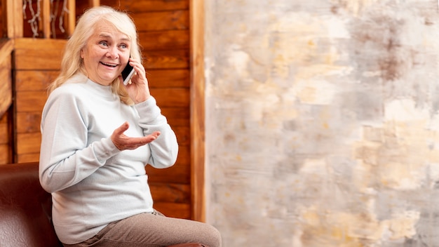 copy-space with woman talking over phone