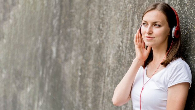 Copy-space woman with headphones