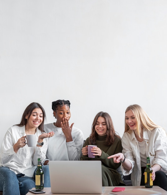 Copy-space womens looking on laptop