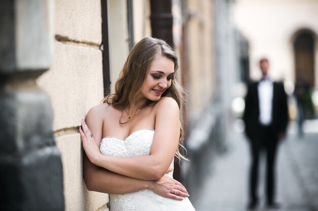 Coquette bride on street