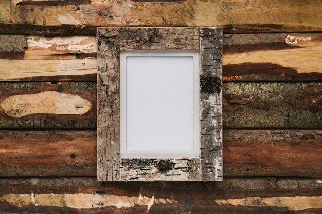 Cork frame on wooden background