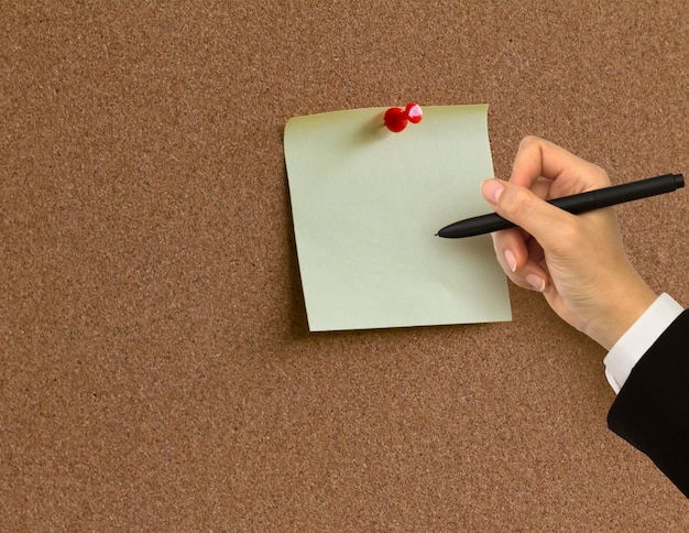 Corkboard with a blank note