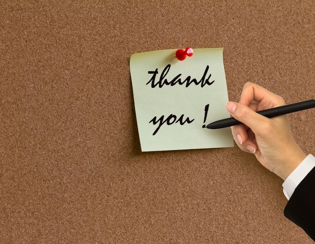 Corkboard with a thanks note