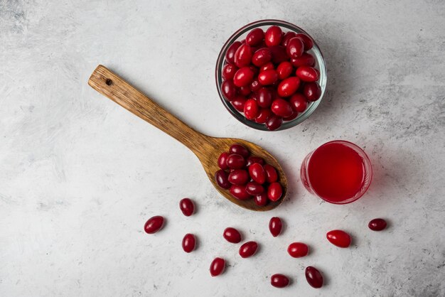 Cornels with juice in the glass . 