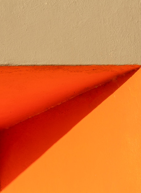 Corner of an orange wall front view