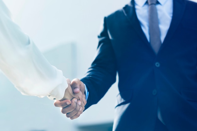 Corporate business handshake between partners