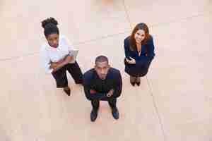 Free photo corporate portrait of business team of three