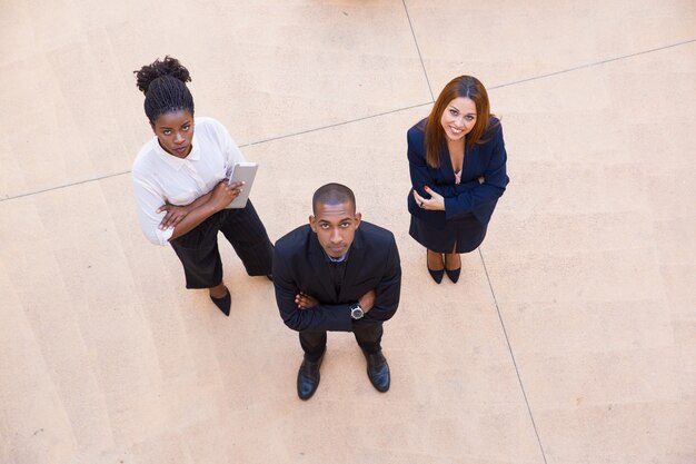 Corporate portrait of business team of three