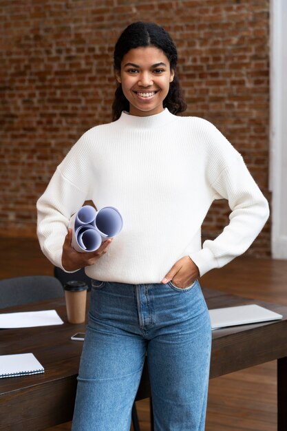 Corporate woman posing at the office