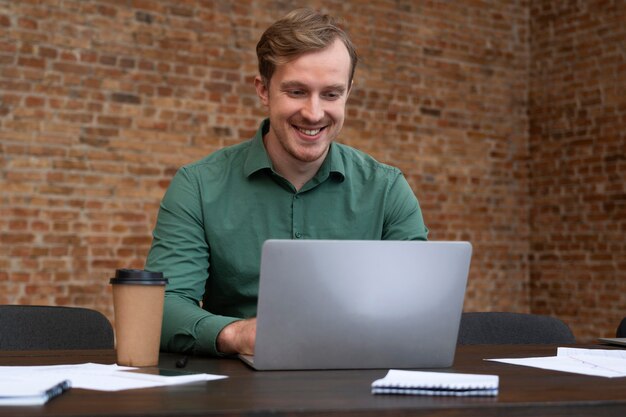 Corporate worker enjoying to be back at the office