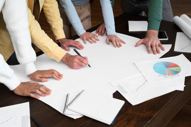 Free photo corporate workers brainstorming together