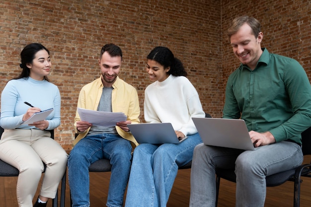 Free photo corporate workers brainstorming together