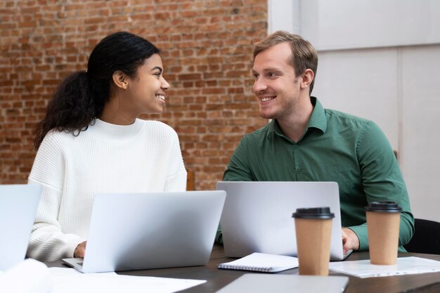 Corporate workers brainstorming together