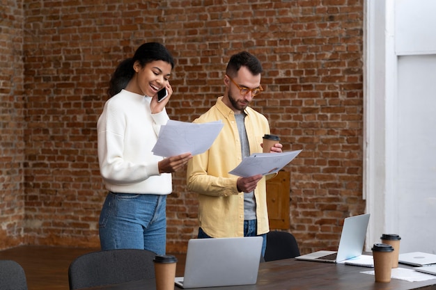 Corporate workers brainstorming together