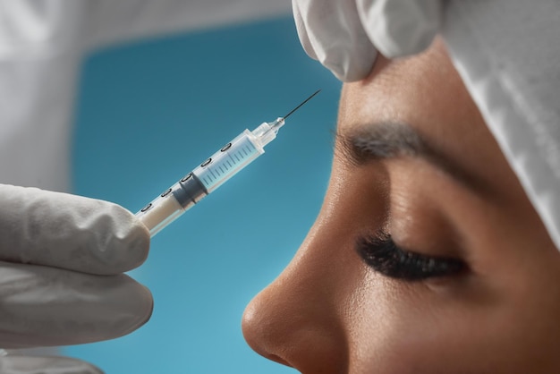 Cosmetic botox injection in female forehead