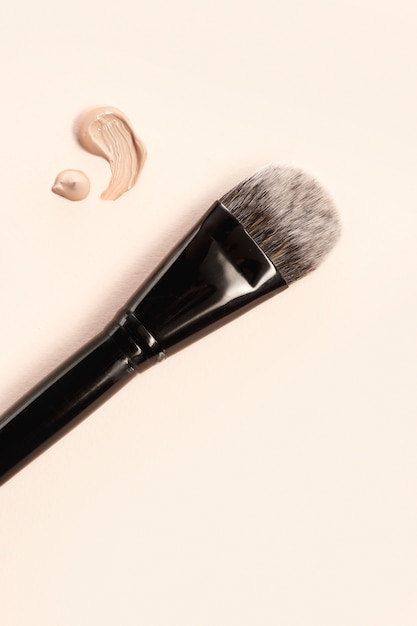 Cosmetic foundation cream and powder with brush