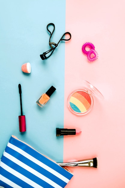 Free photo cosmetics near striped makeup bag