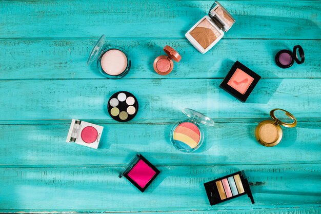 Cosmetics on wooden background