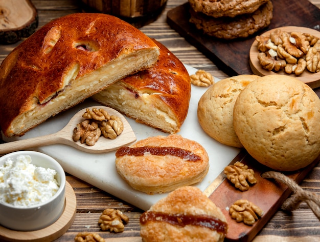 Cottage cheese kyata with cherries, shortbread cookies and nuts