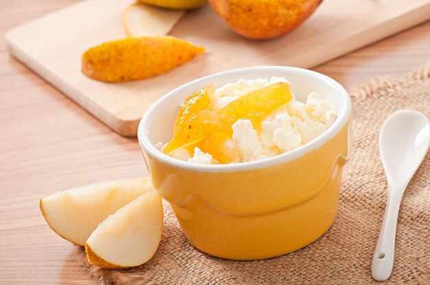 Cottage cheese with pear jam in a bowl