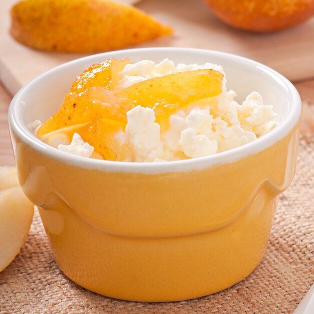 Cottage cheese with pear jam in a bowl