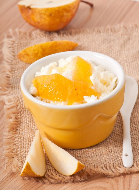 Cottage cheese with pear jam in a bowl