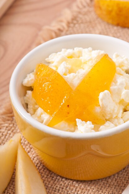 Cottage cheese with pear jam in a bowl