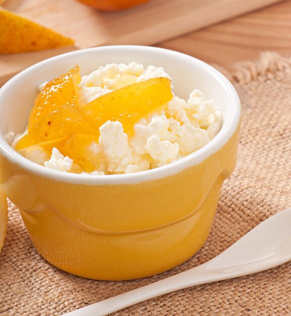 Cottage cheese with pear jam in a bowl