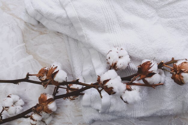 Cotton flowers on towels