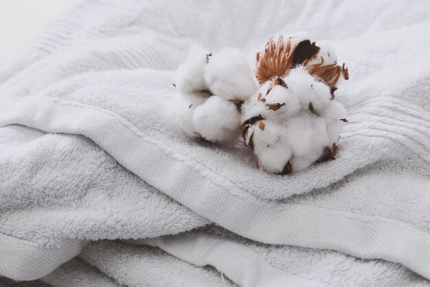 Cotton flowers on towels