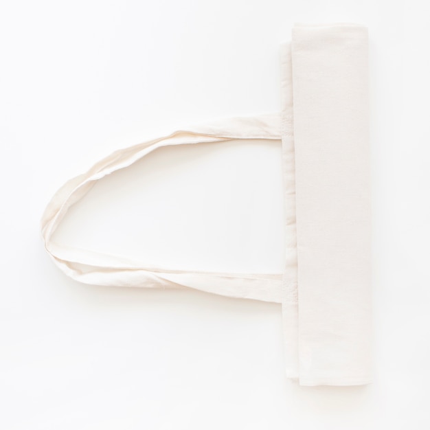 Free photo cotton white hand bag with handle on white background